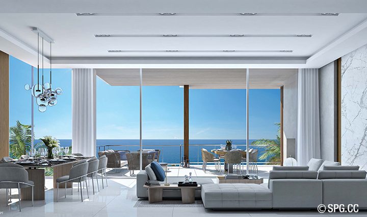 A great room spills out to a generous terrace with a built-in linear fireplace, summer kitchen and glass railing for unobstructed ocean views.