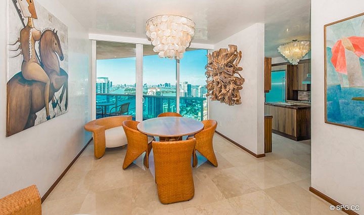 Dining Room with City Views in Residence 3806 at Portofino Tower, Luxury Waterfront Condominiums in Miami Beach, Florida 33139