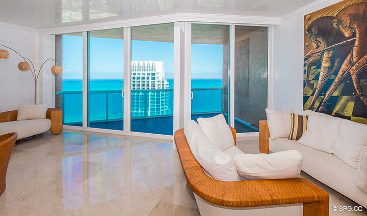 Living Room with Terrace Access in Residence 3806 at Portofino Tower, Luxury Waterfront Condominiums in Miami Beach, Florida 33139